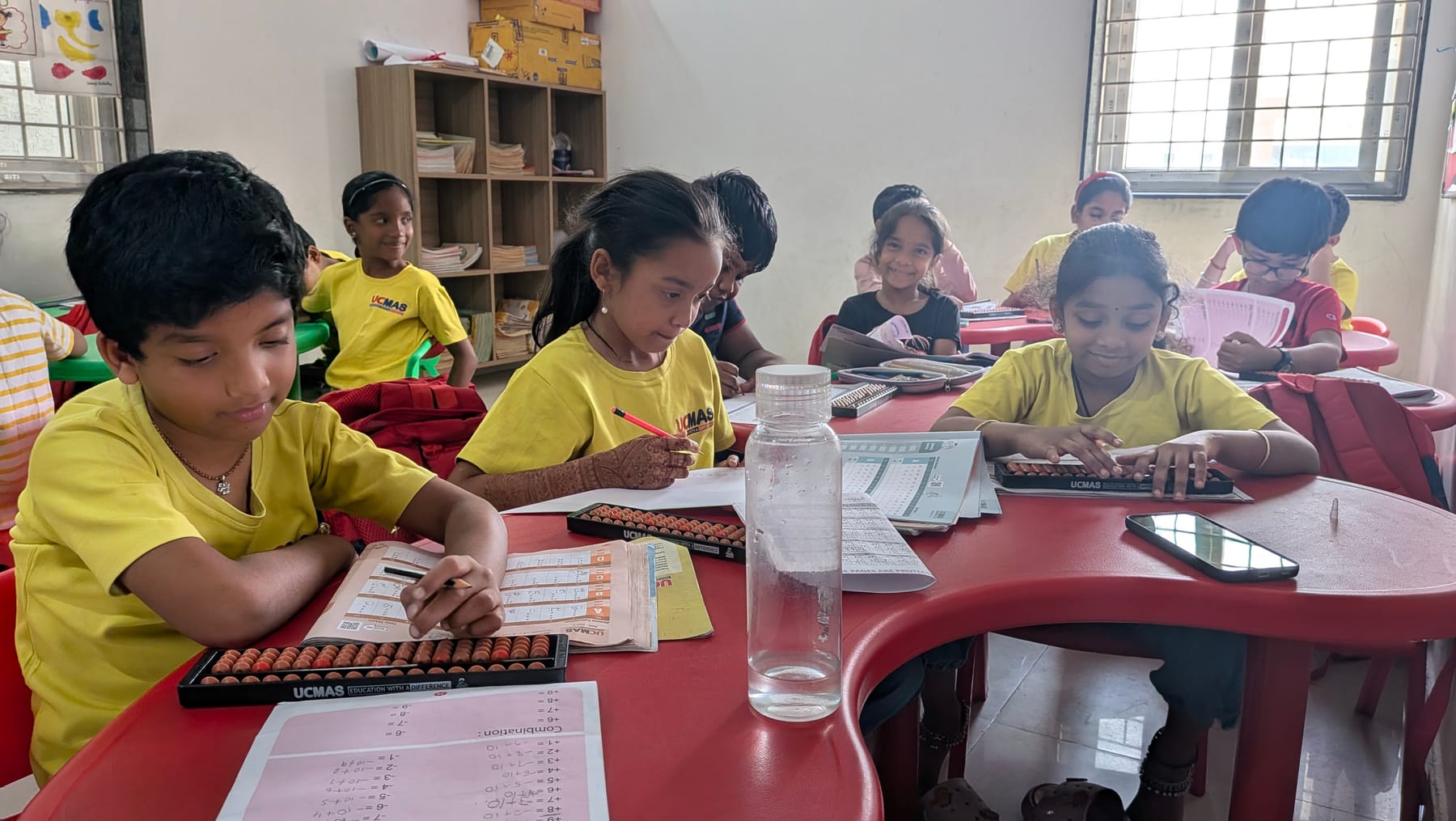 Students practising mental arithmetic on their abacuses at UCMAS Beeramguda